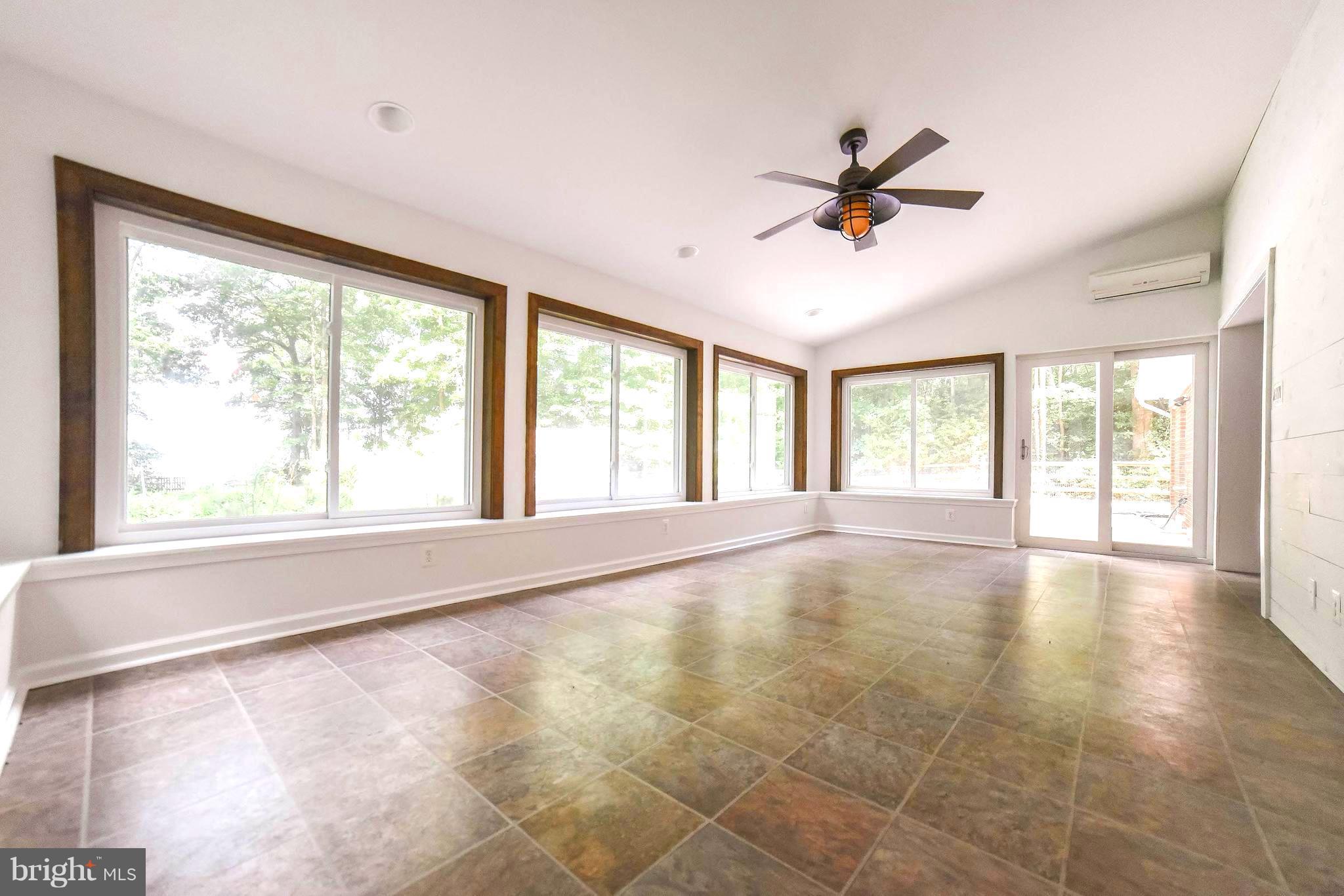 3540 Patuxent Road Huntingtown, MD 20639 - Photo 8 of 29 a view of an empty room with a window