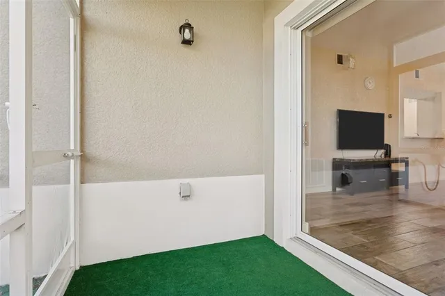 a view of a house with a yard and plants