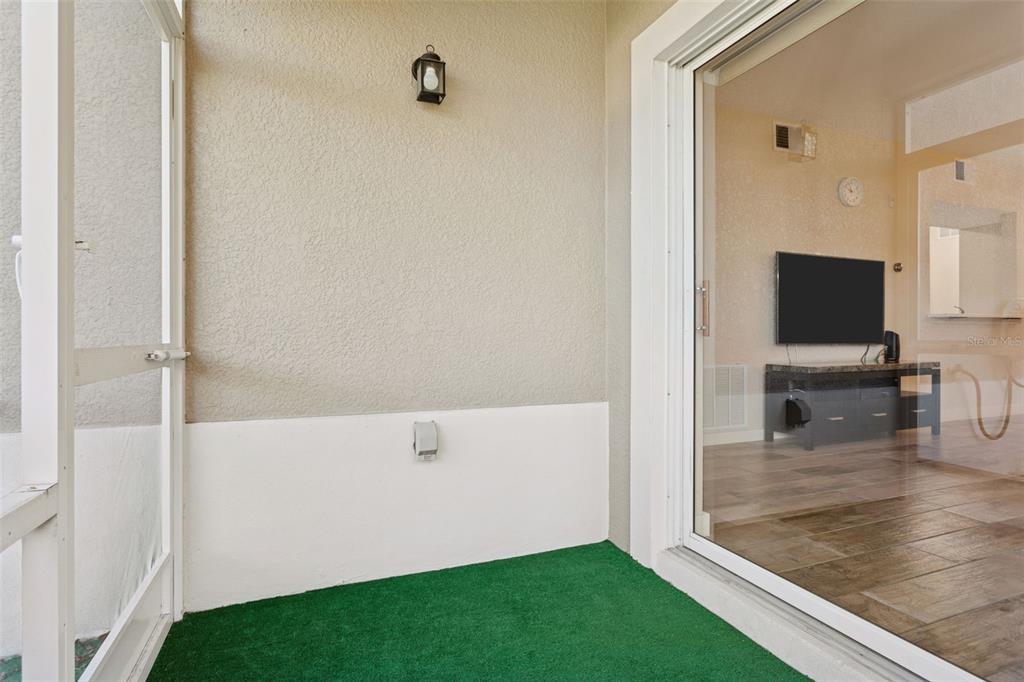 1231 Godavari Way, Unit 101 Wesley Chapel, FL 33543 - Photo 24 of 36 a view of kitchen and bathroom