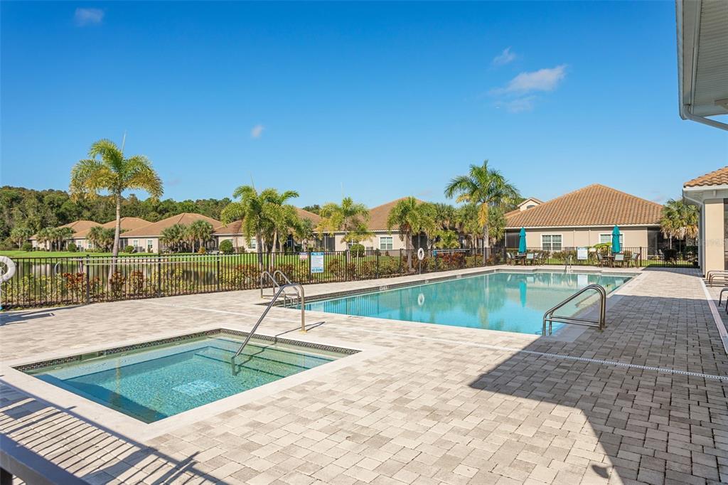 1231 Godavari Way, Unit 101 Wesley Chapel, FL 33543 - Photo 28 of 36 a view of a swimming pool and a terrace