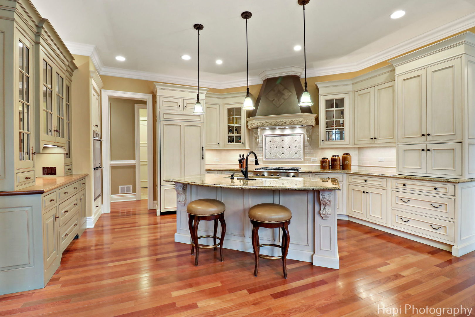 2158 Scott Road Northbrook, IL 60062 - Photo 19 of 57 a kitchen with granite countertop wooden floors cabinets and appliances