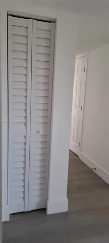 a bathroom with a sink a toilet and vanity