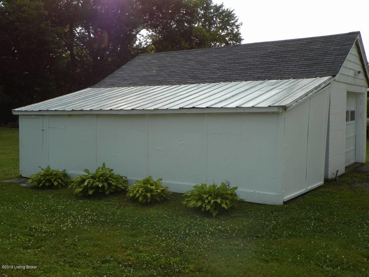 14412 Oldham Acres Road Prospect, KY 40059 - Photo 30 of 42 Side of the extra deep storage building attached to the convenient 1.5 car garage.