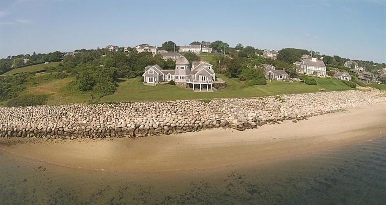66 Briggs Way Chatham, MA 02633 - Photo 1 of 30 a view of a lake with a mountain in the back