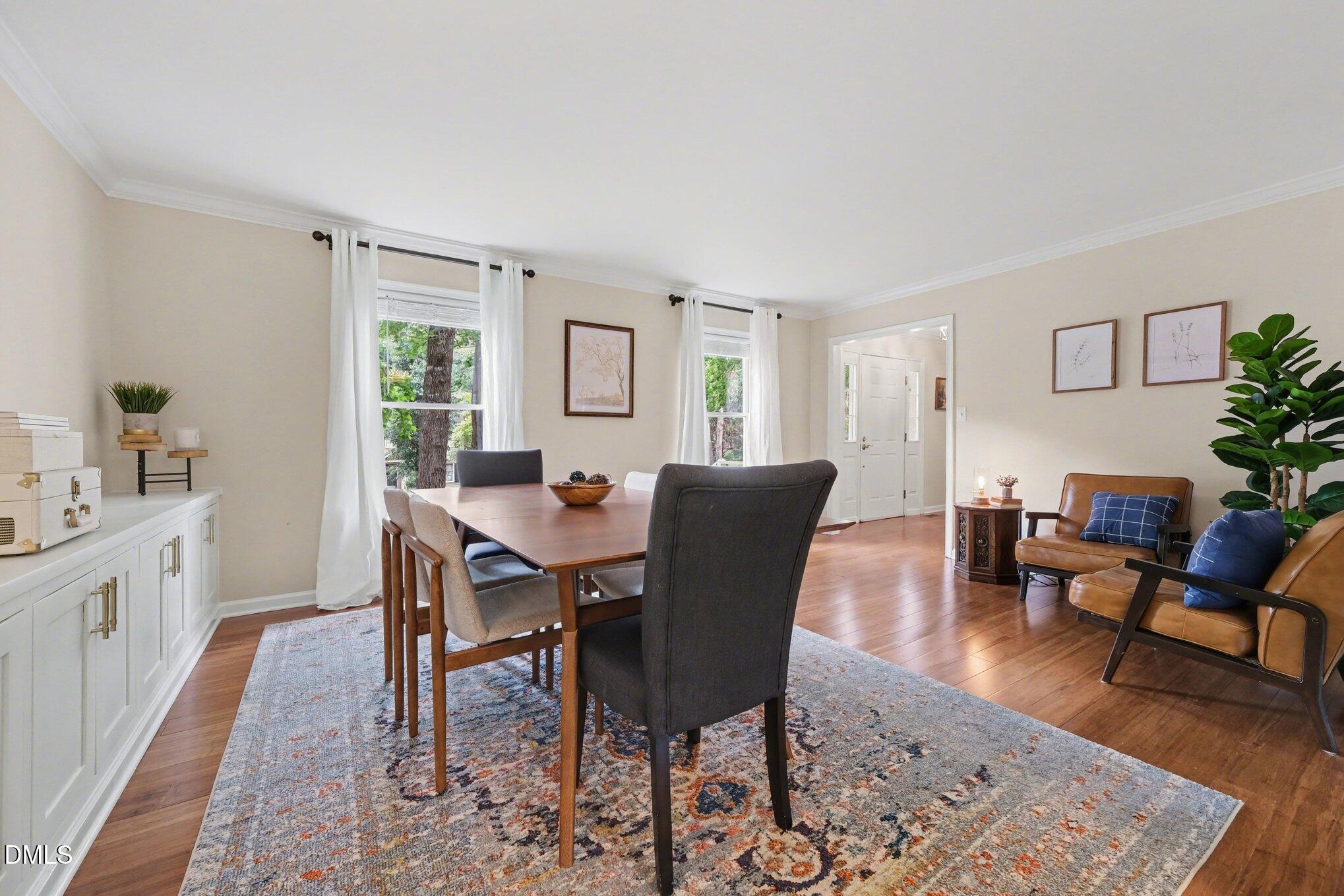 103 Leckford Way Cary, NC 27513 - Photo 11 of 49 a view of a dining room with furniture