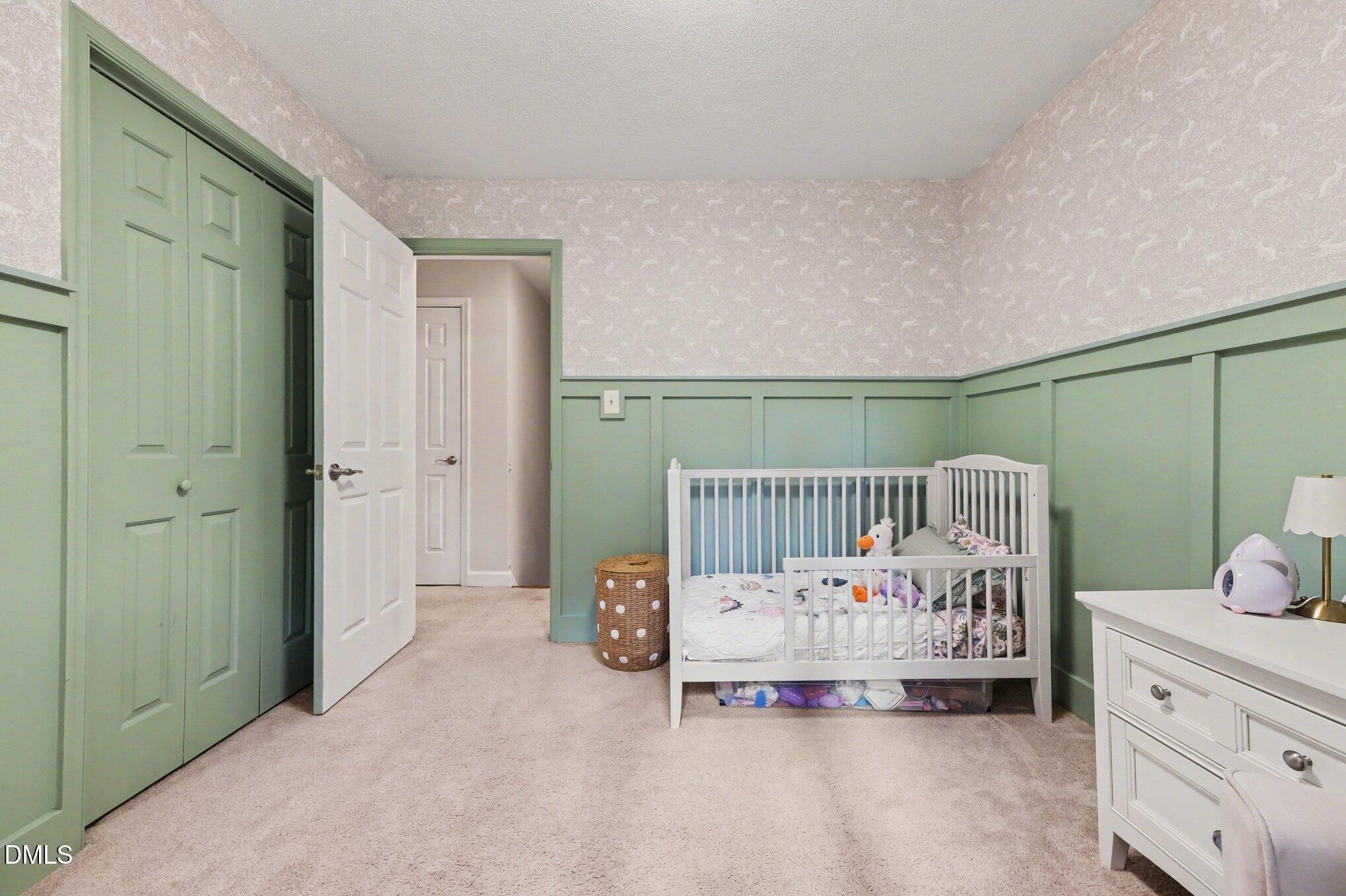 103 Leckford Way Cary, NC 27513 - Photo 26 of 49 a view of a hallway with a bedroom