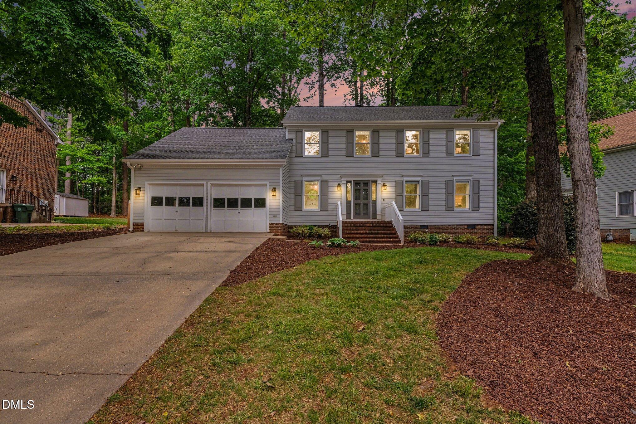 103 Leckford Way Cary, NC 27513 - Photo 49 of 49 a front view of a house with a yard