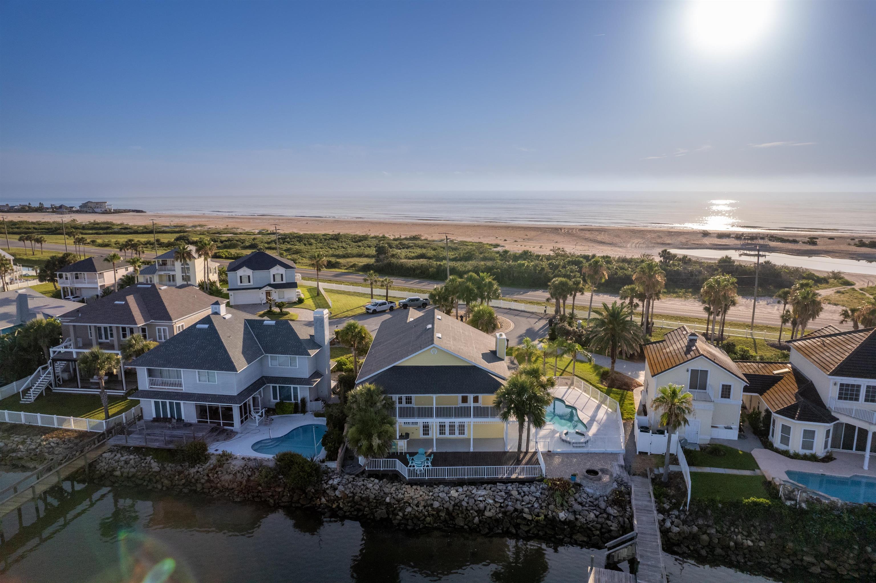 9277 July Lane St. Augustine, FL 32080 - Photo 11 of 72 an aerial view of residential houses with outdoor space and ocean view