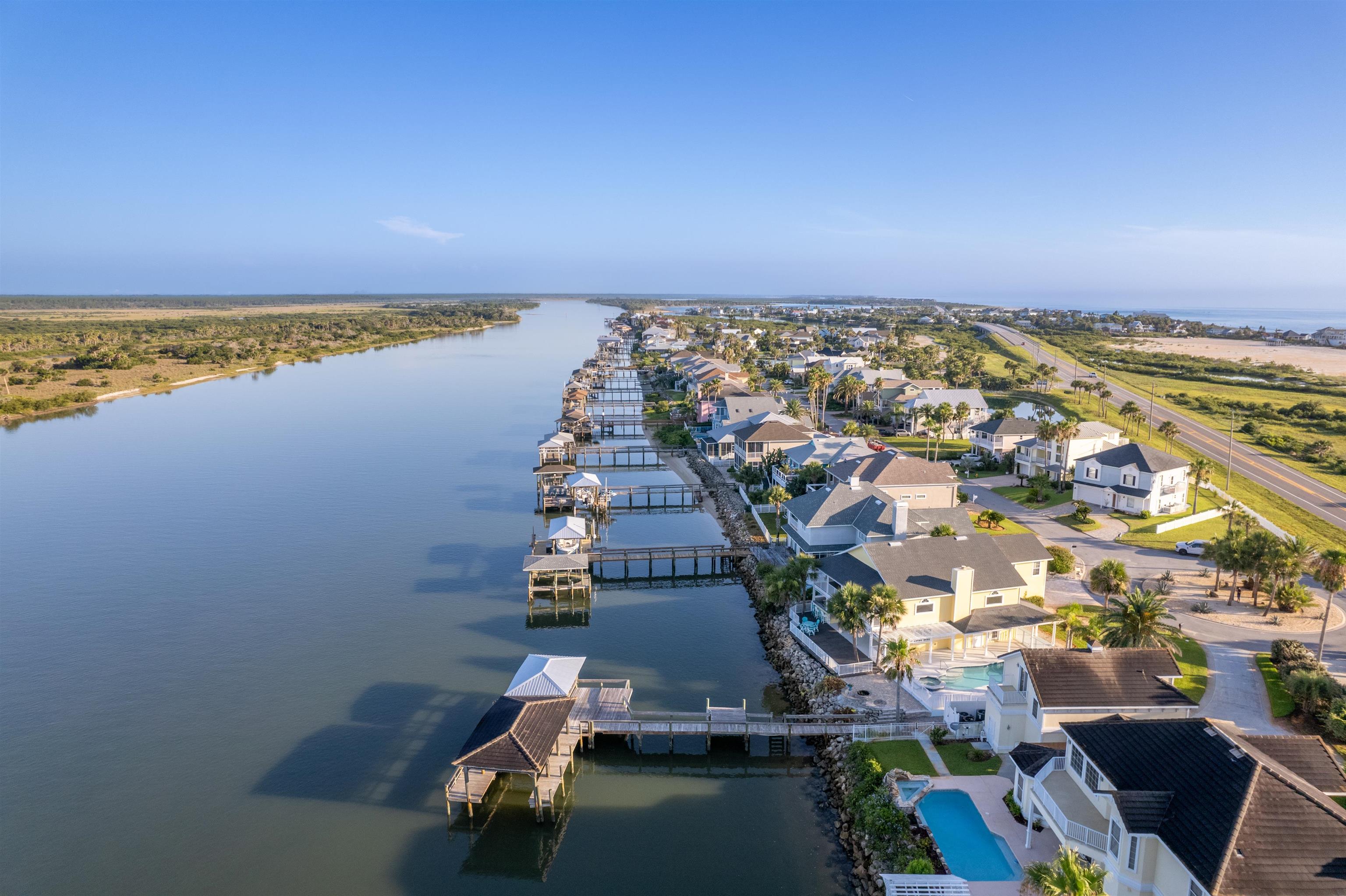 9277 July Lane St. Augustine, FL 32080 - Photo 13 of 72 an aerial view of a city with ocean view