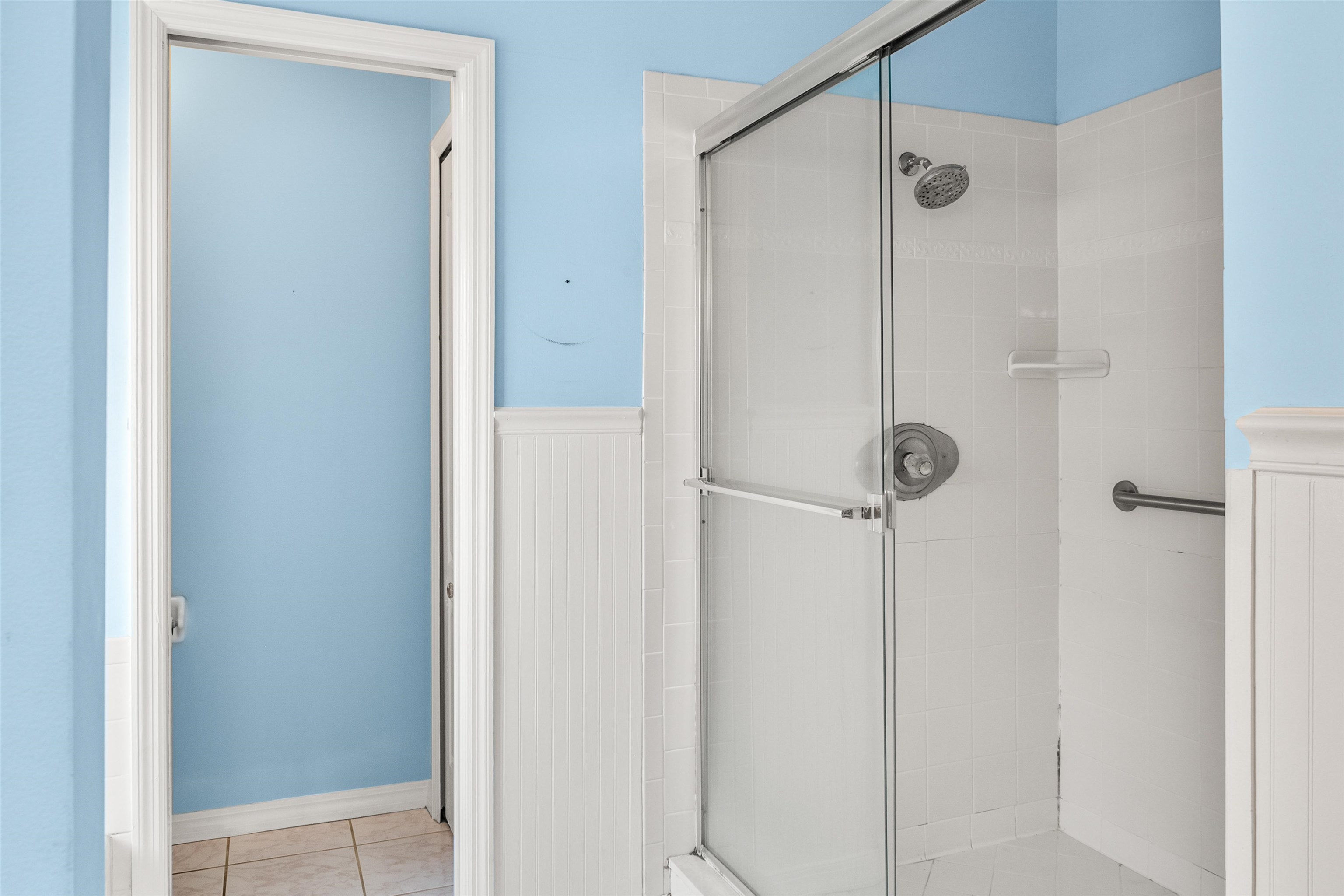 9277 July Lane St. Augustine, FL 32080 - Photo 43 of 72 a bathroom with a shower