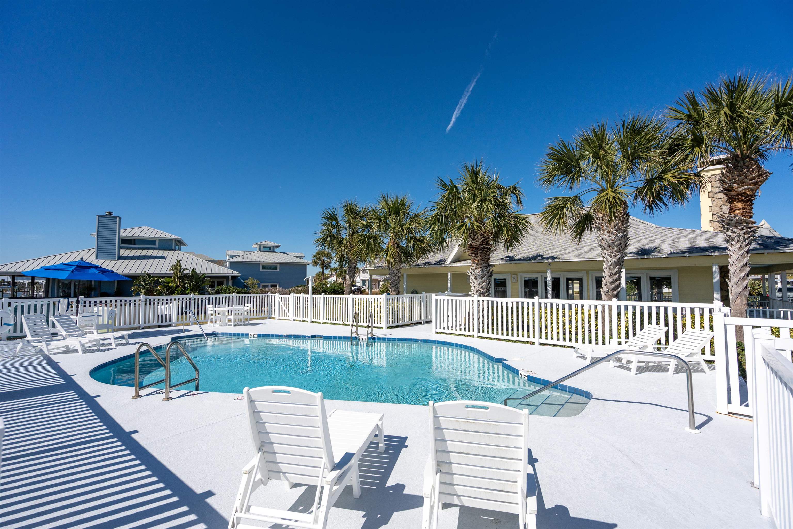 9277 July Lane St. Augustine, FL 32080 - Photo 62 of 72 a view of a swimming pool with a patio