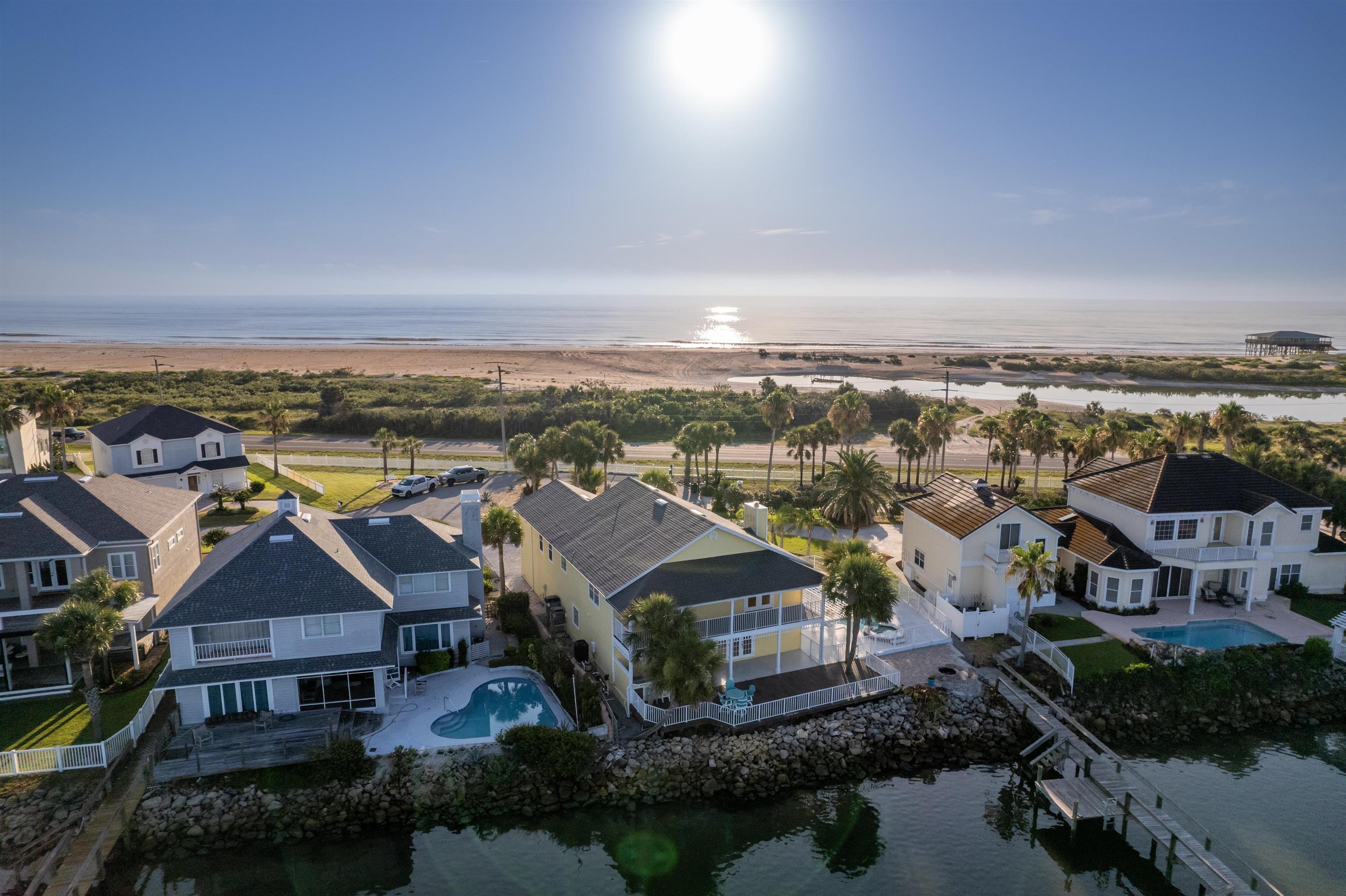 9277 July Lane St. Augustine, FL 32080 - Photo 10 of 72 an aerial view of a house with a lake view