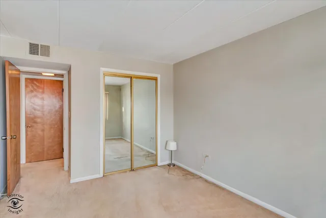 an empty room with sliding door