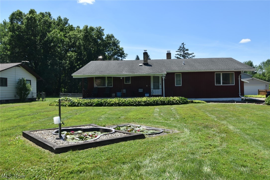 12840 South Reed Road Grafton, OH 44044 - Photo 27 of 27 View of front of house featuring a front lawn