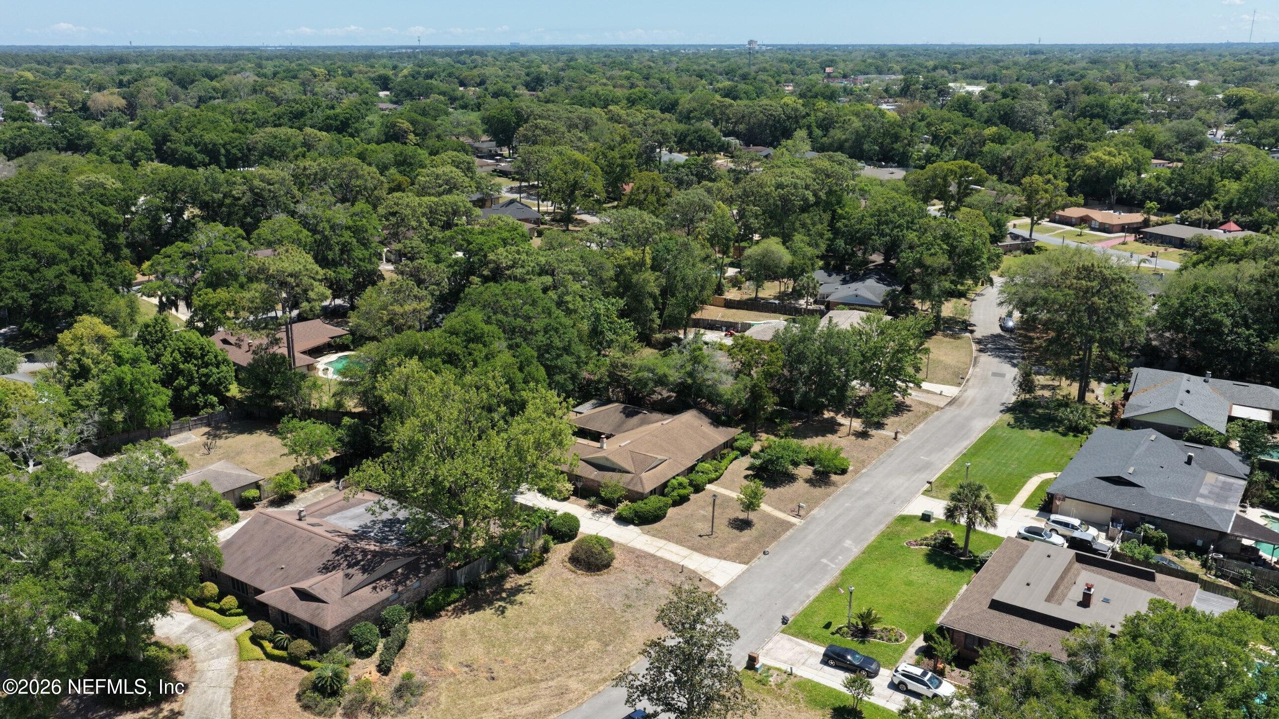 3371 Debussy Road Jacksonville, FL 32277 - Photo 7 of 21 DJI_20260423135931_0006_D