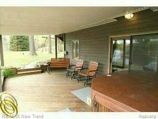 341 Ridgemont Road Oxford, MI 48370 - Photo 15 of 23 Covered Walkout Deck