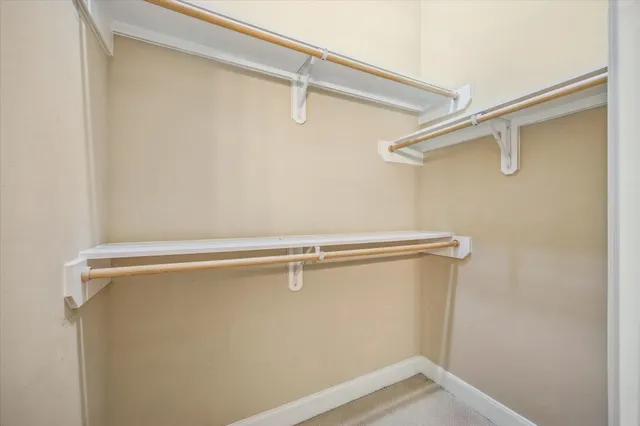 a view of a room with racks on the wall