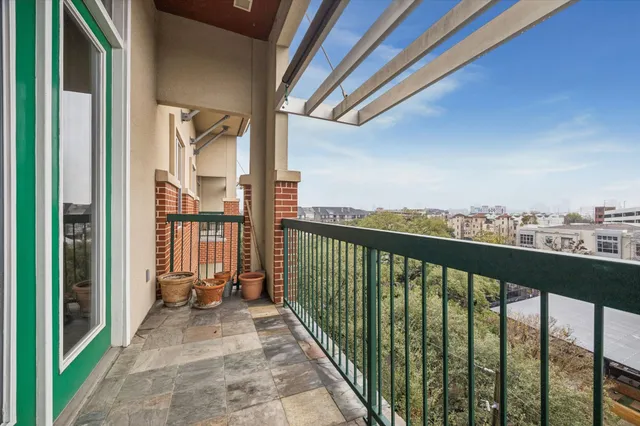 a view of a balcony with city view