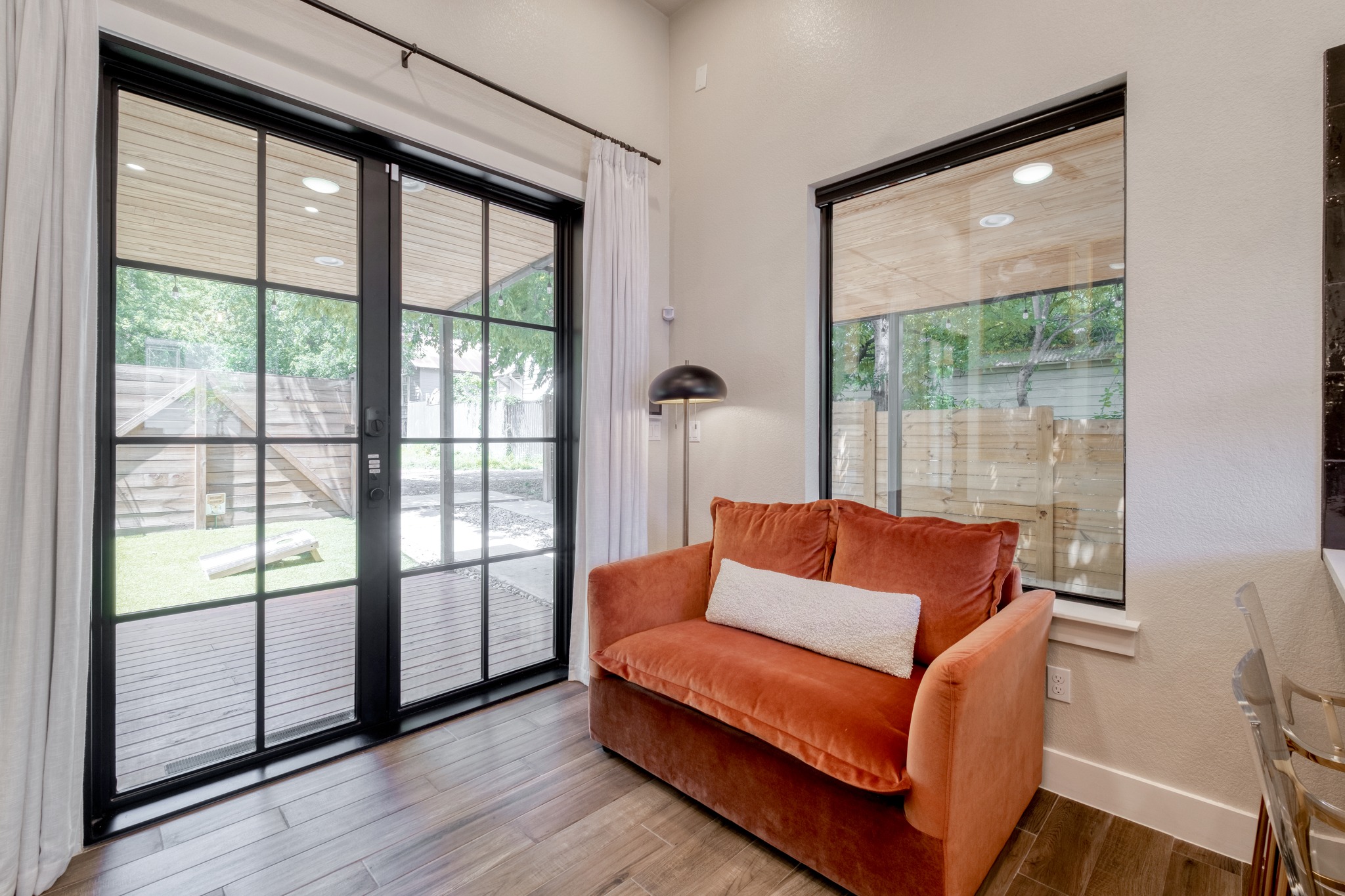 1904 East 16th Street, Unit 2 Austin, TX 78702 - Photo 9 of 20 Room featuring wood-finish flooring, recessed lighting, and a large window