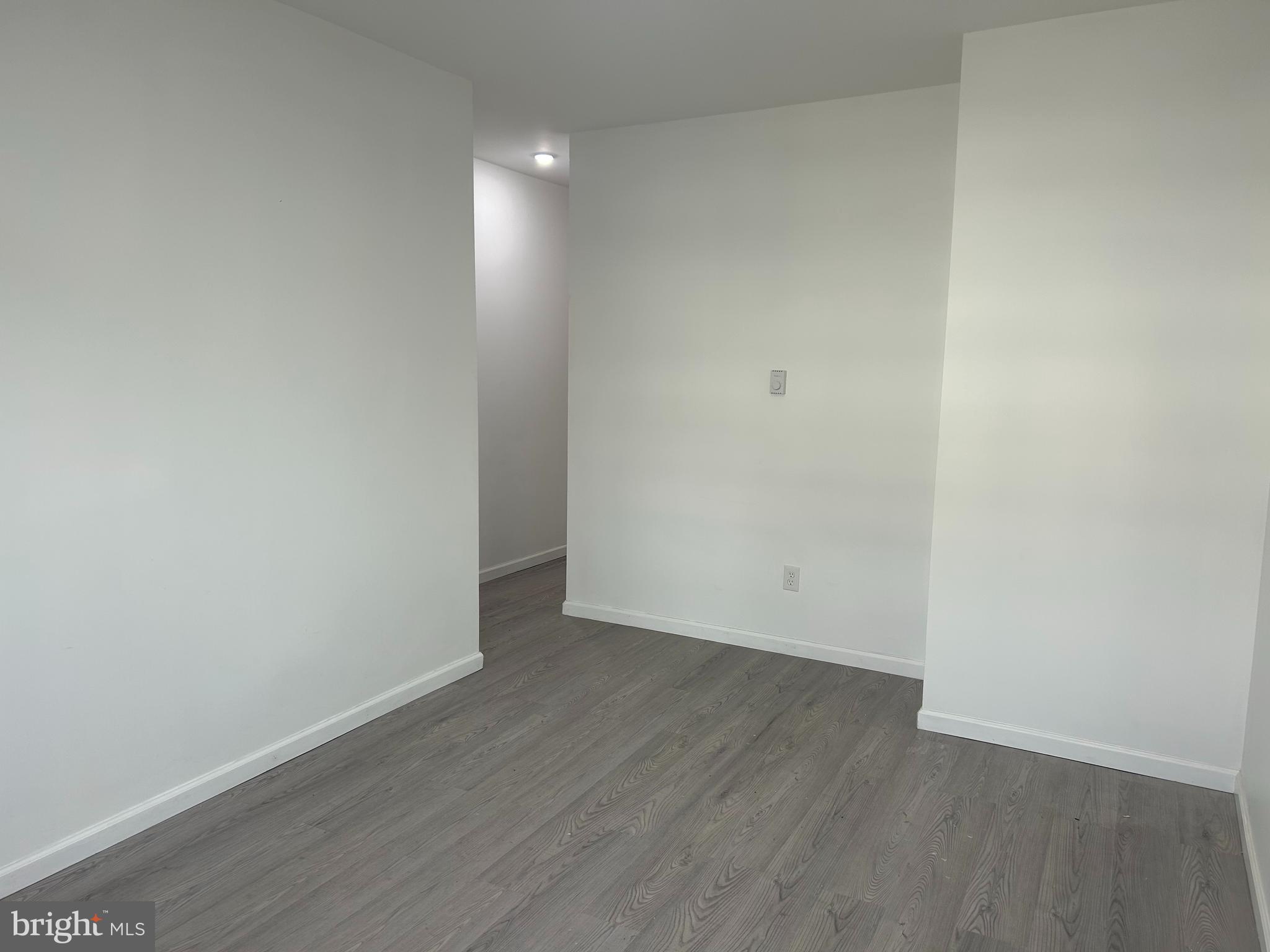 222 West Patterson Street, Unit 2 Lansford, PA 18232 - Photo 4 of 16 a view of an empty room with wooden floor