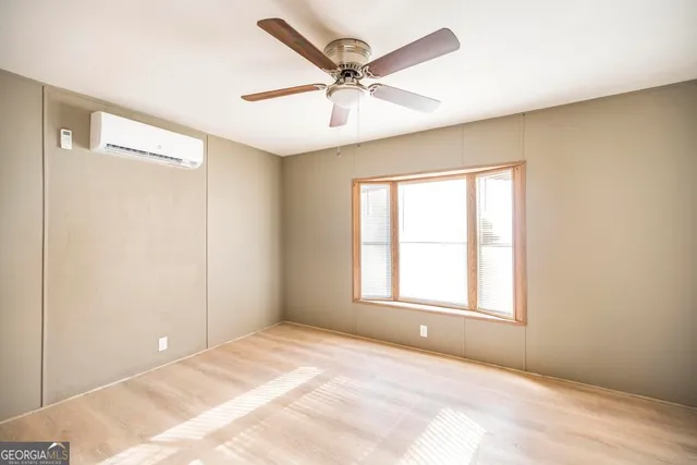 a view of road with large trees