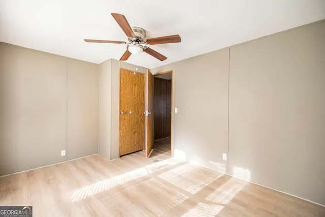 a open kitchen with stainless steel appliances granite countertop a refrigerator and a sink