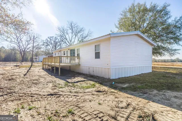 a view of a house with a roof deck