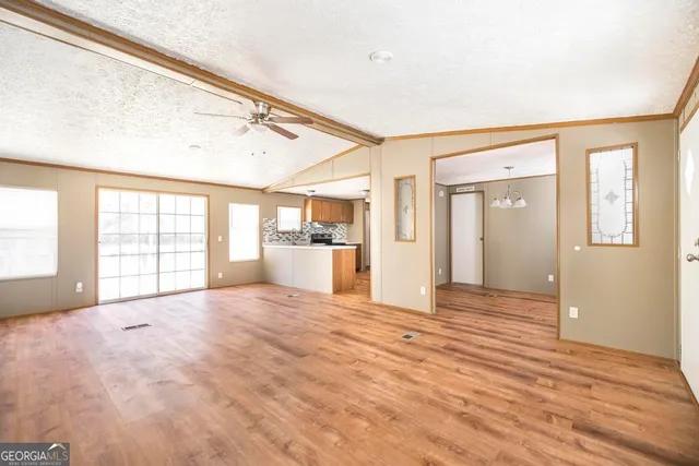 a kitchen with a stove and a sink