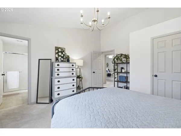 a bedroom with a bed and furniture