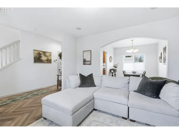 a living room with furniture and a couch