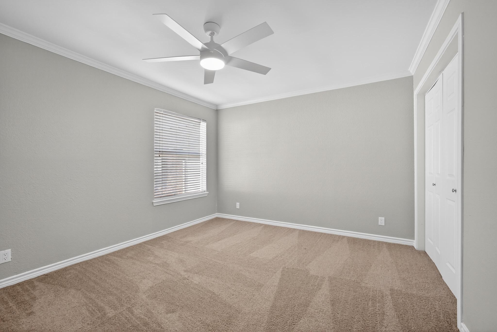 1221 Cedar Post Lane, Unit 4B Houston, TX 77055 - Photo 13 of 16 a view of an empty room with a window