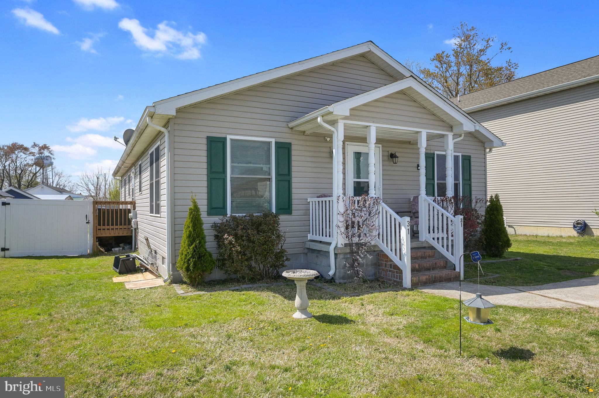 31 Reed Street Harrington, DE 19952 - Photo 1 of 24 a house view with a garden space