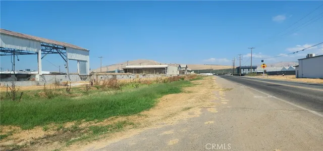 a view of a street with an outdoor space
