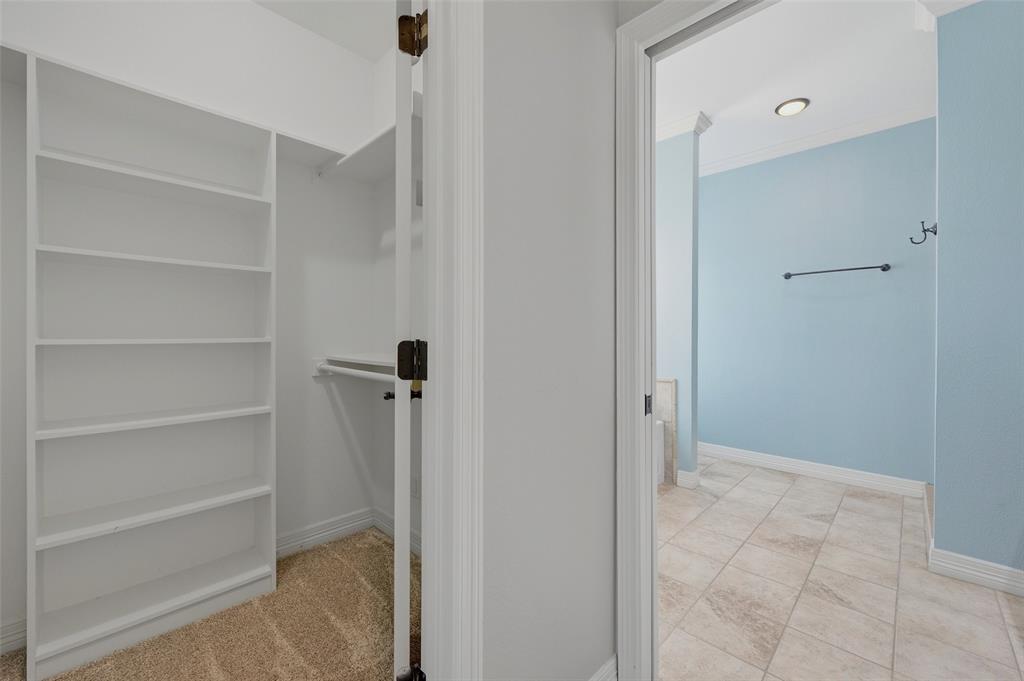 785 Schneider Road Howe, TX 75459 - Photo 22 of 40 a view of a walk in closet