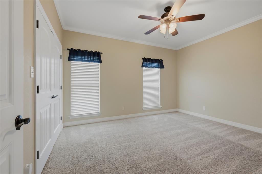 785 Schneider Road Howe, TX 75459 - Photo 25 of 40 a view of an empty room and a ceiling fan window