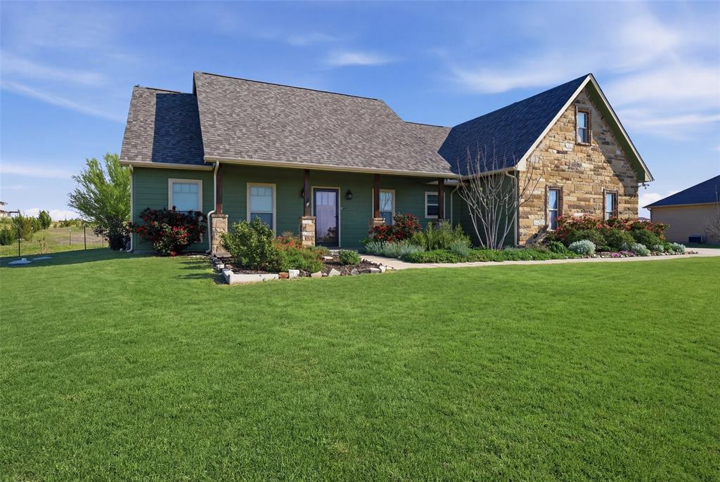 785 Schneider Road Howe, TX 75459 - Photo 35 of 40 a front view of a house with a yard patio and green space