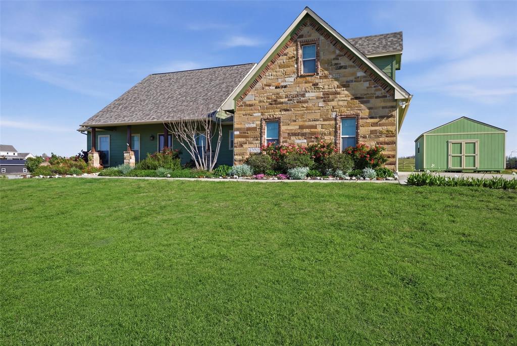 785 Schneider Road Howe, TX 75459 - Photo 37 of 40 a front view of a house with a yard