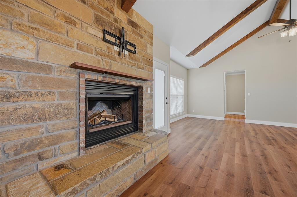 785 Schneider Road Howe, TX 75459 - Photo 8 of 40 a living room with a fireplace