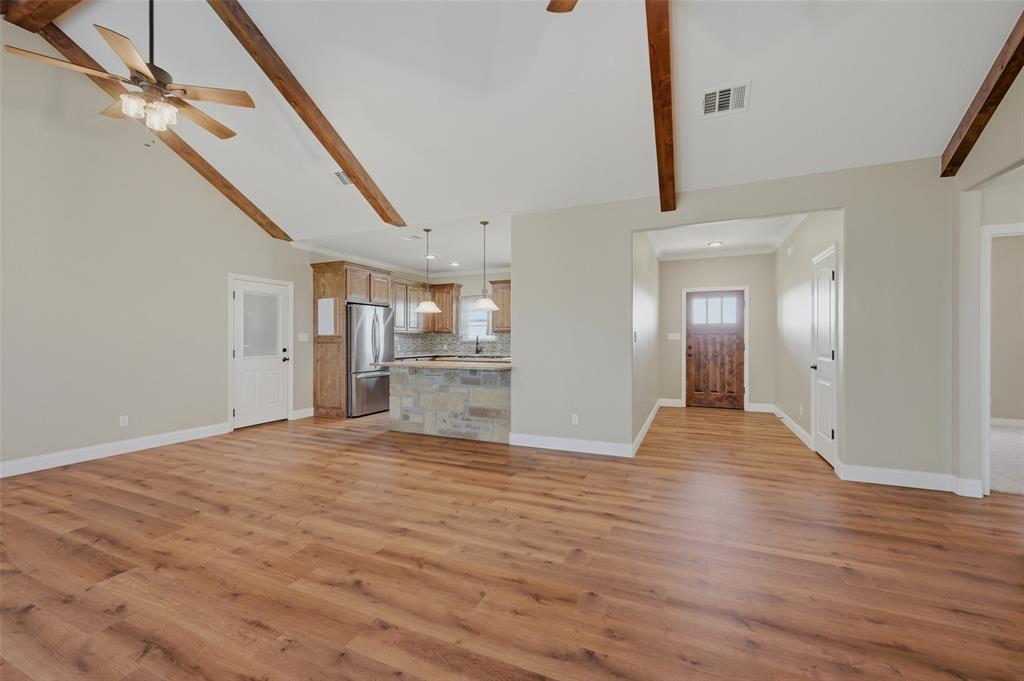 785 Schneider Road Howe, TX 75459 - Photo 9 of 40 a view of empty room with wooden floor