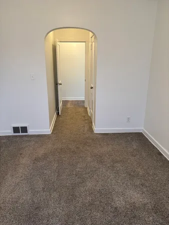 an empty room with a door