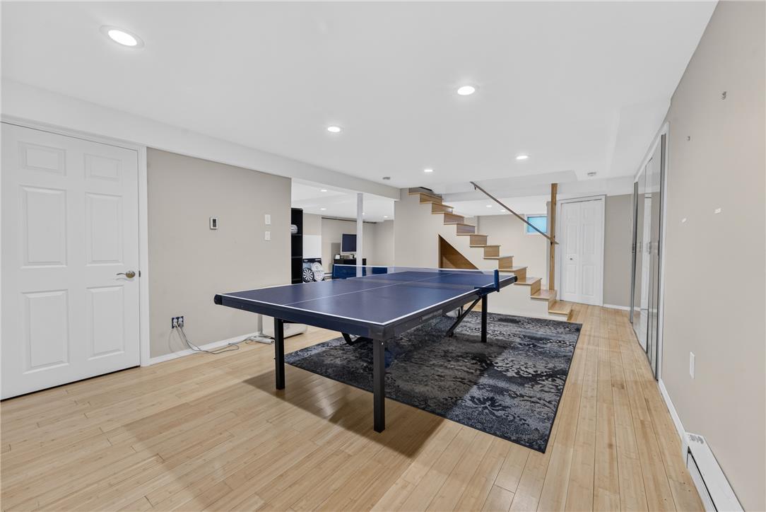 220 Pennbrook Road Stroudsburg, PA 18360 - Photo 39 of 60 Ample recreation space awaits, featuring light hardwood floors and recessed lighting.