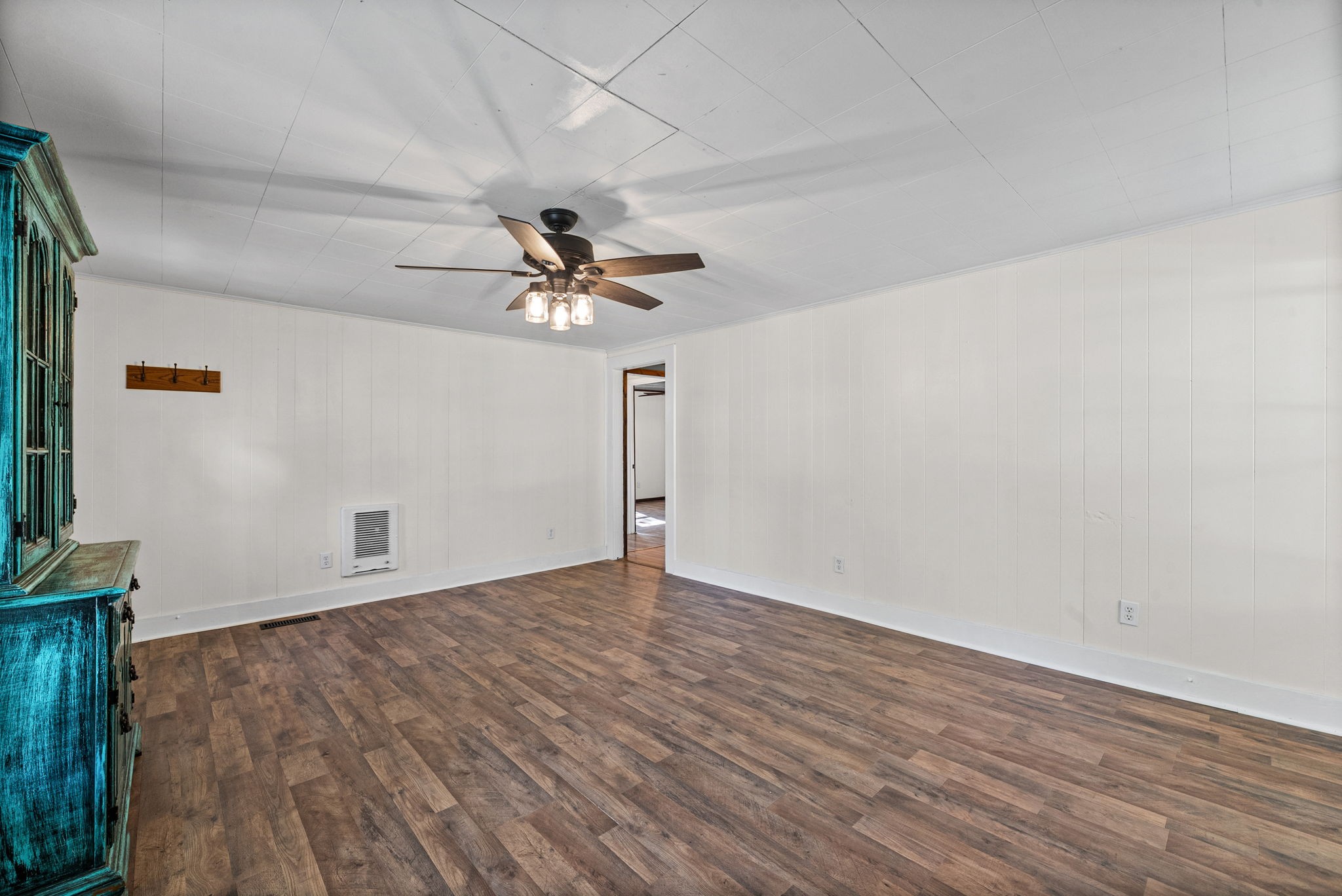 59 Perry Street Cadiz, KY 42211 - Photo 5 of 32 a view of an empty room with wooden floor