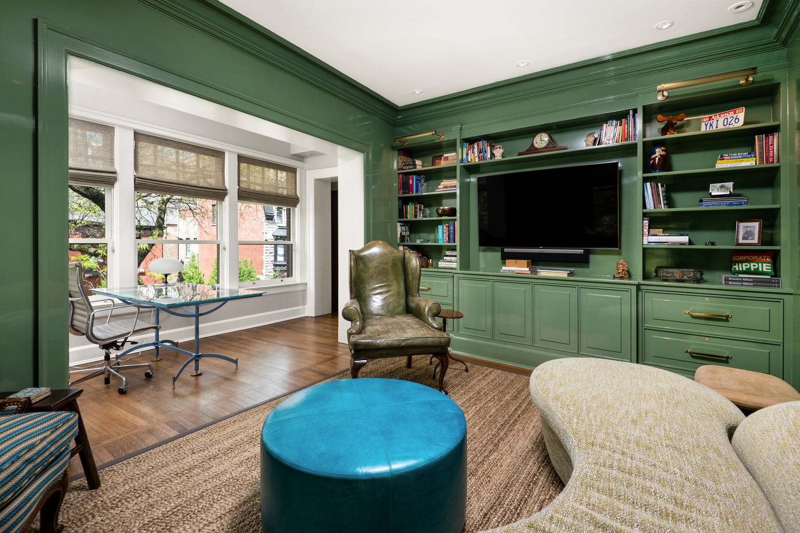 1235 North Astor Street, Unit 2S Chicago, IL 60610 - Photo 15 of 21 a living room with furniture a flat screen tv and floor to ceiling window