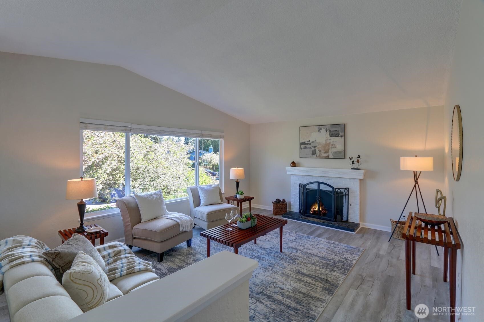 2507 173rd Place Southeast Bothell, WA 98012 - Photo 5 of 30 a living room with furniture and a fireplace