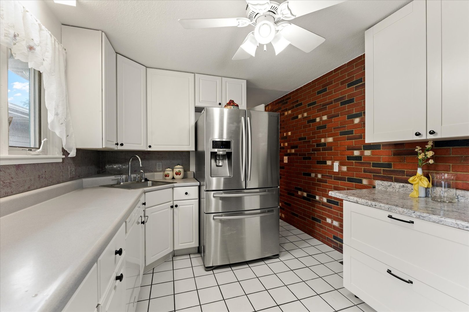 102 North Condit Street Tolono, IL 61880 - Photo 22 of 35 a kitchen with stainless steel appliances a refrigerator sink and microwave