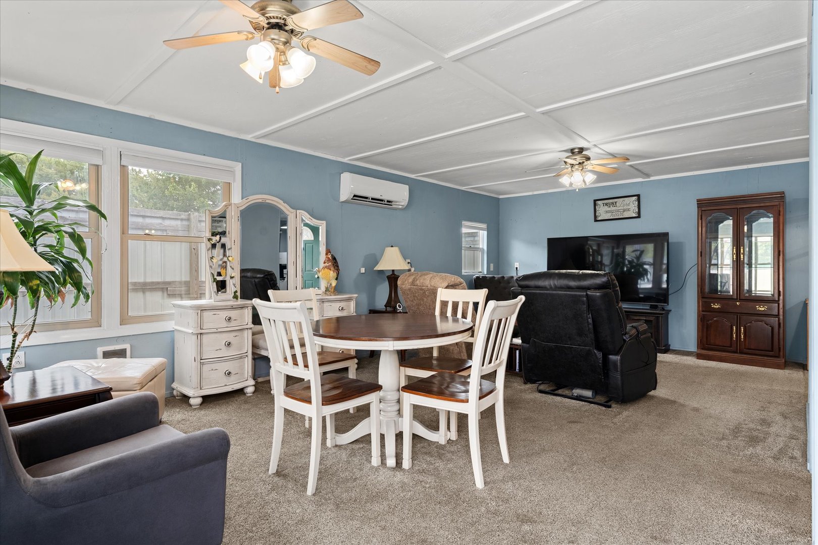 102 North Condit Street Tolono, IL 61880 - Photo 28 of 35 a view of a dining room with furniture and a chandelier
