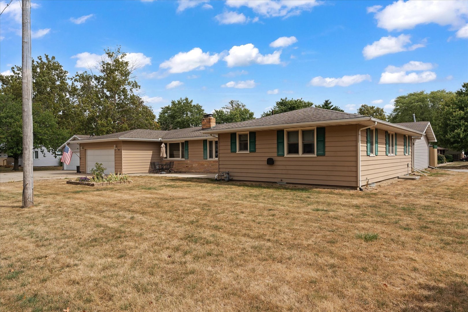 102 North Condit Street Tolono, IL 61880 - Photo 3 of 35 a front view of a house with yard