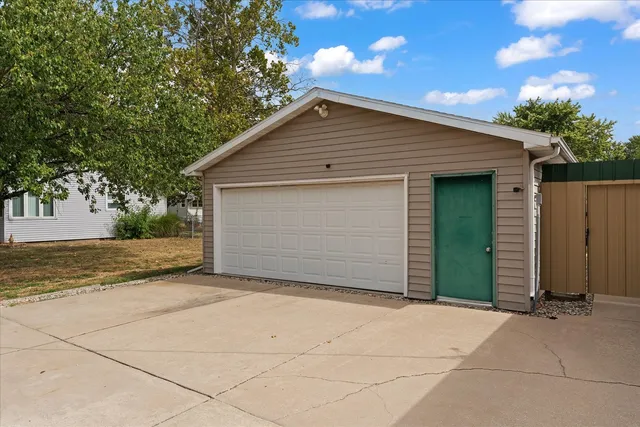 a view of garage yard and tree