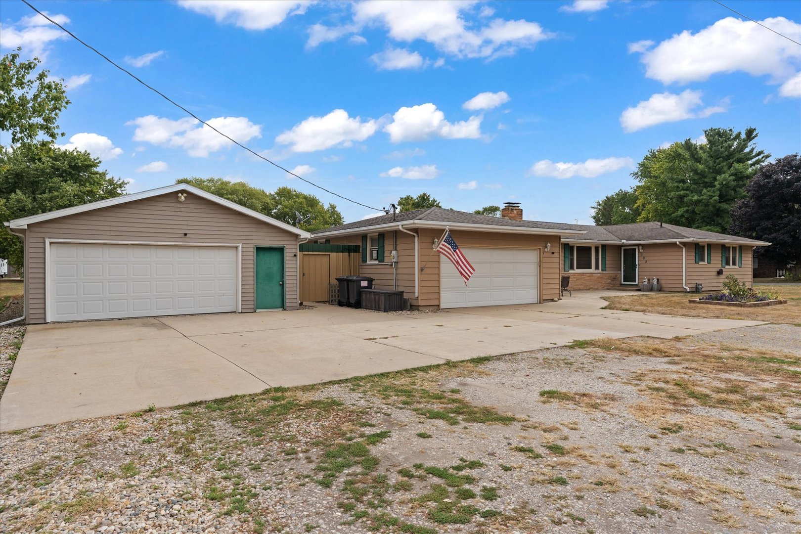 102 North Condit Street Tolono, IL 61880 - Photo 4 of 35 front view of a house with a yard