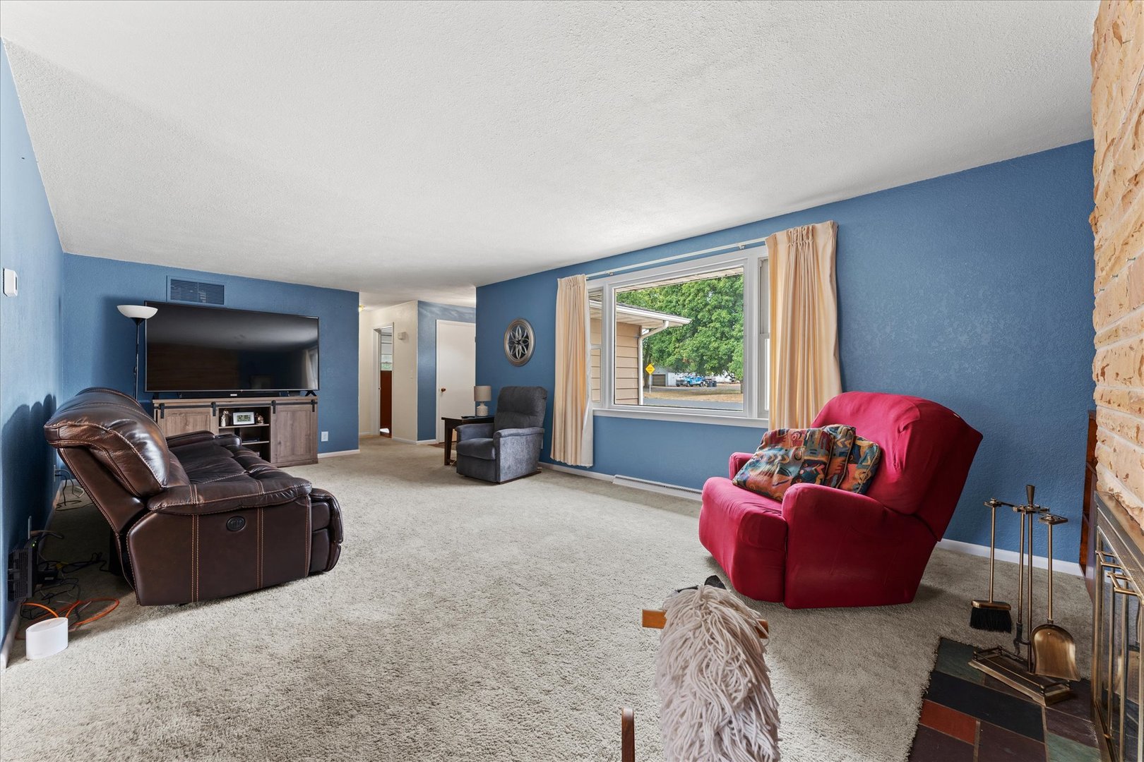 102 North Condit Street Tolono, IL 61880 - Photo 7 of 35 a living room with furniture and a flat screen tv